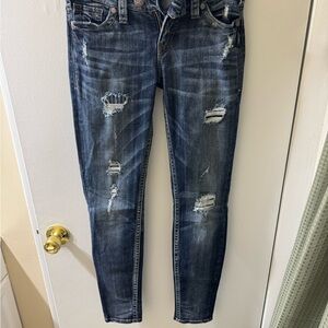 Distressed Blue Jeans